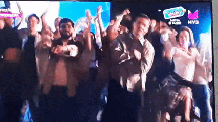 Crowd dancing at an outdoor concert in Gudermes, Russia