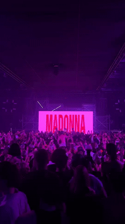 Live concert in London, purple lights and pink screen