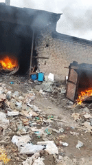 Fires burn through trash debris in Ol'khovskoye, Russia