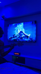 Guitarist performs in blue-lit room for social media challenge