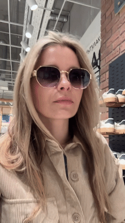 Shopping mall visit in Minsk with clothing store browsing