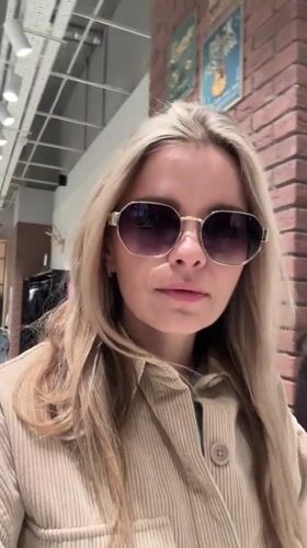 Shopping mall visit in Minsk with clothing store browsing