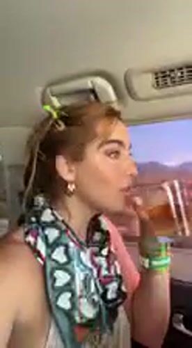 Woman with colorful hair clips recorded inside vehicle in Whitewater