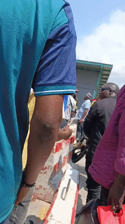 Large motorcycle crowd assembles on Dar es Salaam street