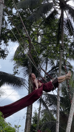 Tourists enjoy swings and ziplines at Tegallalang Rice Terraces