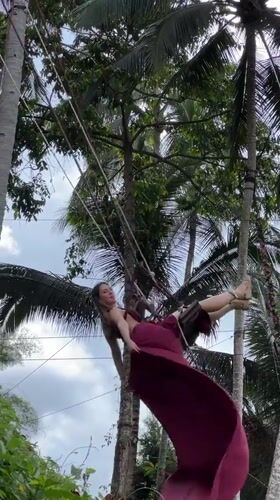 Tourists enjoy swings and ziplines at Tegallalang Rice Terraces