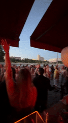 Dawn outdoor party with female DJ draws dancing crowds in Moscow
