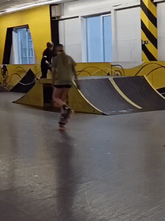 Children roller skating indoors in Novosibirsk facility