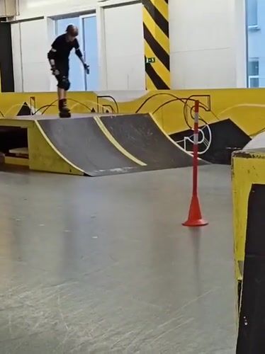 Children roller skating indoors in Novosibirsk facility