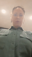 Woman in green shirt filmed in Podgorica apartment