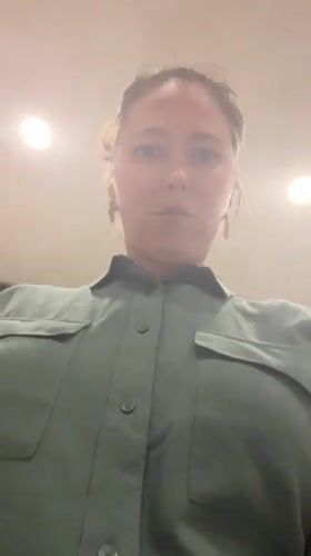 Woman in green shirt filmed in Podgorica apartment