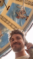 Man enjoys carousel ride at Tashkent amusement park