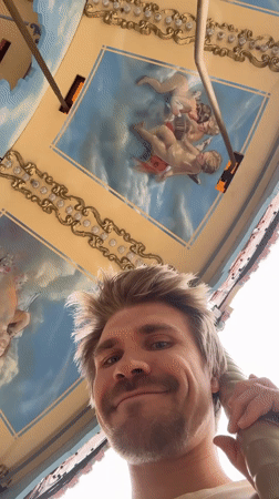 Man enjoys carousel ride at Tashkent amusement park