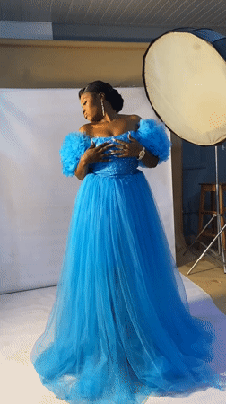 Studio photoshoot in Bukuru featuring a dramatic blue tulle gown