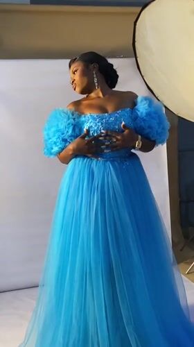 Studio photoshoot in Bukuru featuring a dramatic blue tulle gown