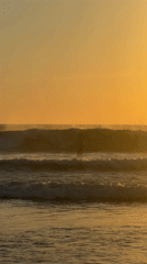 Beachgoers enjoy clear morning at North Kuta, Indonesia