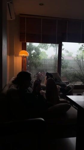 Rainy morning in at a Chang Phueak home, indoors and out