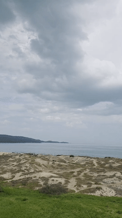 Coastal landscape documented in Primorsko, Bulgaria under cloudy conditions