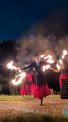Fire dancers perform evening routine in Russian village