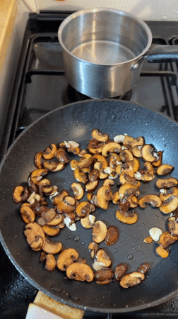 Shrimp, mushrooms, and garlic butter sauce coming together