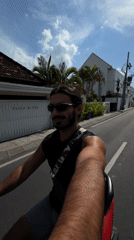 Motorcycle ride through North Kuta with camera in hand