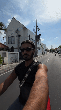 Motorcycle ride through North Kuta with camera in hand