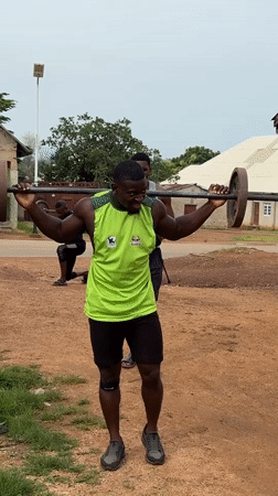Morning outdoor weightlifting session documented in Akwanga, Nigeria