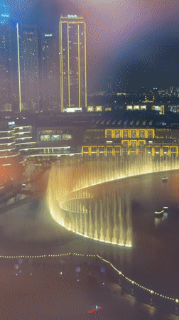 Evening scenes captured across Dubai include fountains, lights, transit