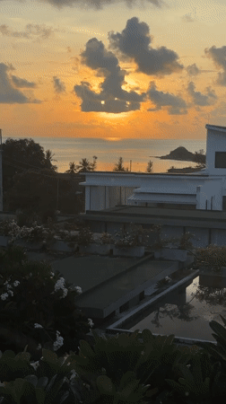 Sunset reflections captured in Choeng Mon pool complex