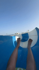 Women enjoy water slides at Egyptian resort park