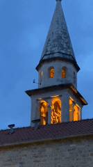 Evening scenes documented around historic Budva waterfront and church