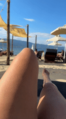Afternoon beach day in Stavros Greece with lounging and refreshments