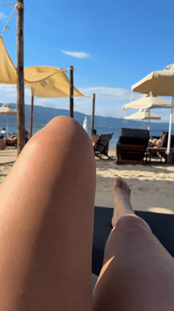 Afternoon beach day in Stavros Greece with lounging and refreshments