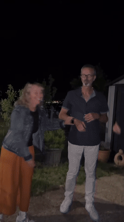 Evening outdoor social gathering with dancing in Chambœuf, France
