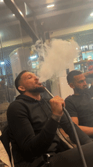 Men gather for hookah at Sevlievo cafe evening