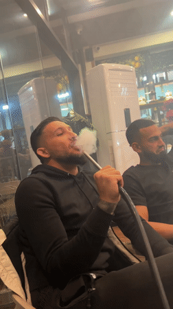 Men gather for hookah at Sevlievo cafe evening