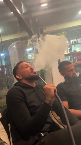 Men gather for hookah at Sevlievo cafe evening