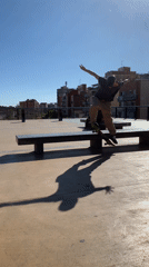 Skateboarder performs bench tricks in l'Hospitalet de Llobregat