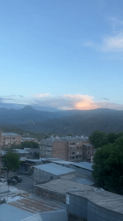 Casual moments captured in Yeghegnadzor: town views and headphones