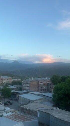 Casual moments captured in Yeghegnadzor: town views and headphones