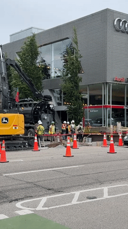 Construction work ongoing on Vancouver street with heavy machinery