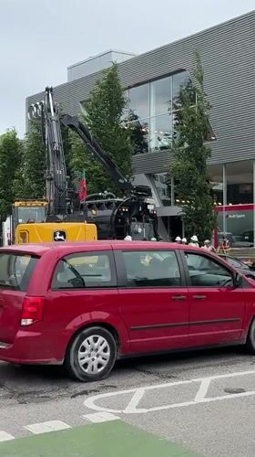 Construction work ongoing on Vancouver street with heavy machinery