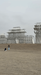 Tourists visit architectural installations in Guazhou County, China
