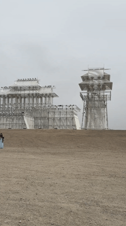 Tourists visit architectural installations in Guazhou County, China