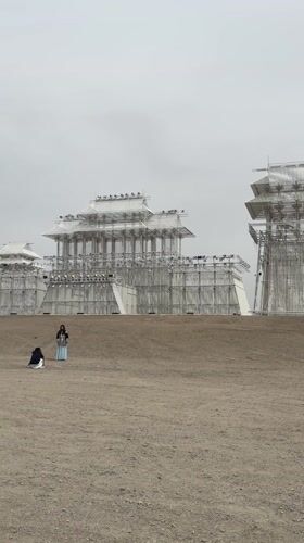 Tourists visit architectural installations in Guazhou County, China