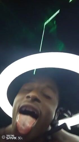 Young man records selfie session with ring lighting in Onitsha