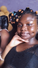 Woman takes playful selfie session in Nsukka bedroom