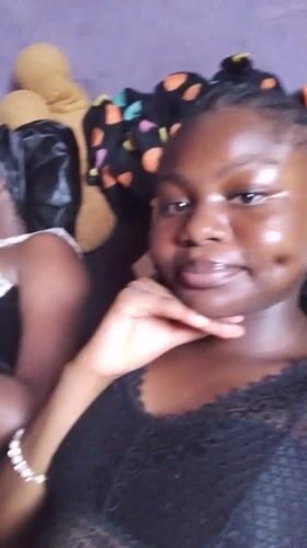 Woman takes playful selfie session in Nsukka bedroom