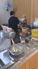 Restaurant staff prepare lunch service in Phu Thuy Ward