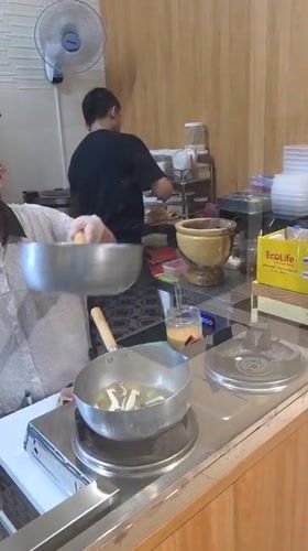 Restaurant staff prepare lunch service in Phu Thuy Ward
